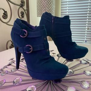 Guess Teal boots with 5” heels. Size 8.5 med. Never worn.